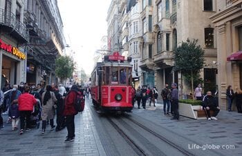 Istiklal Avenue in Istanbul - walking street with a historic tram (İstiklal Caddesi)